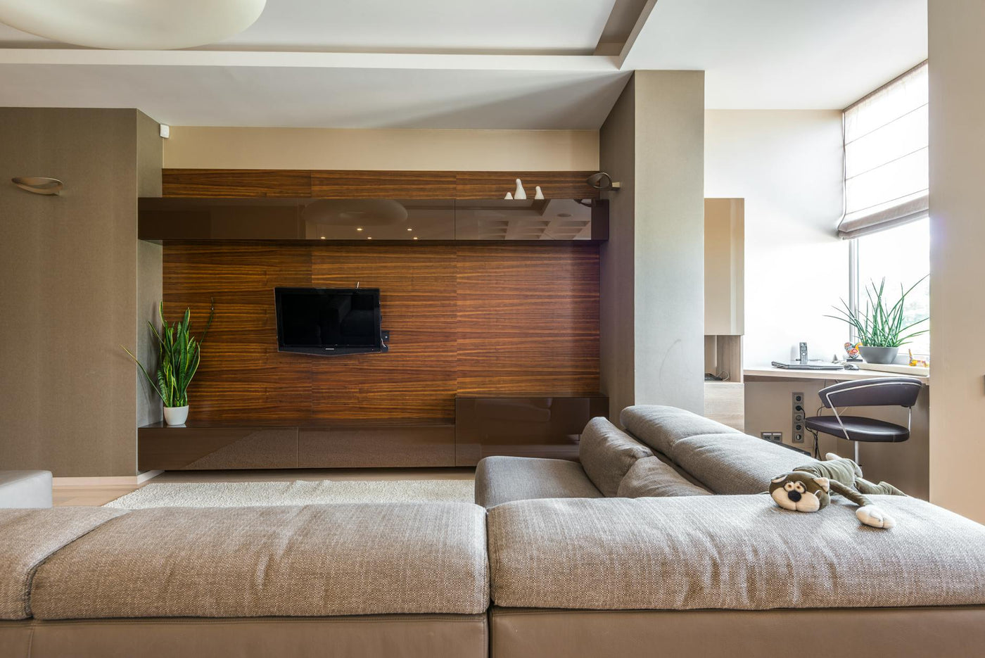 Stylish living room interior with modern furniture and elegant decor.